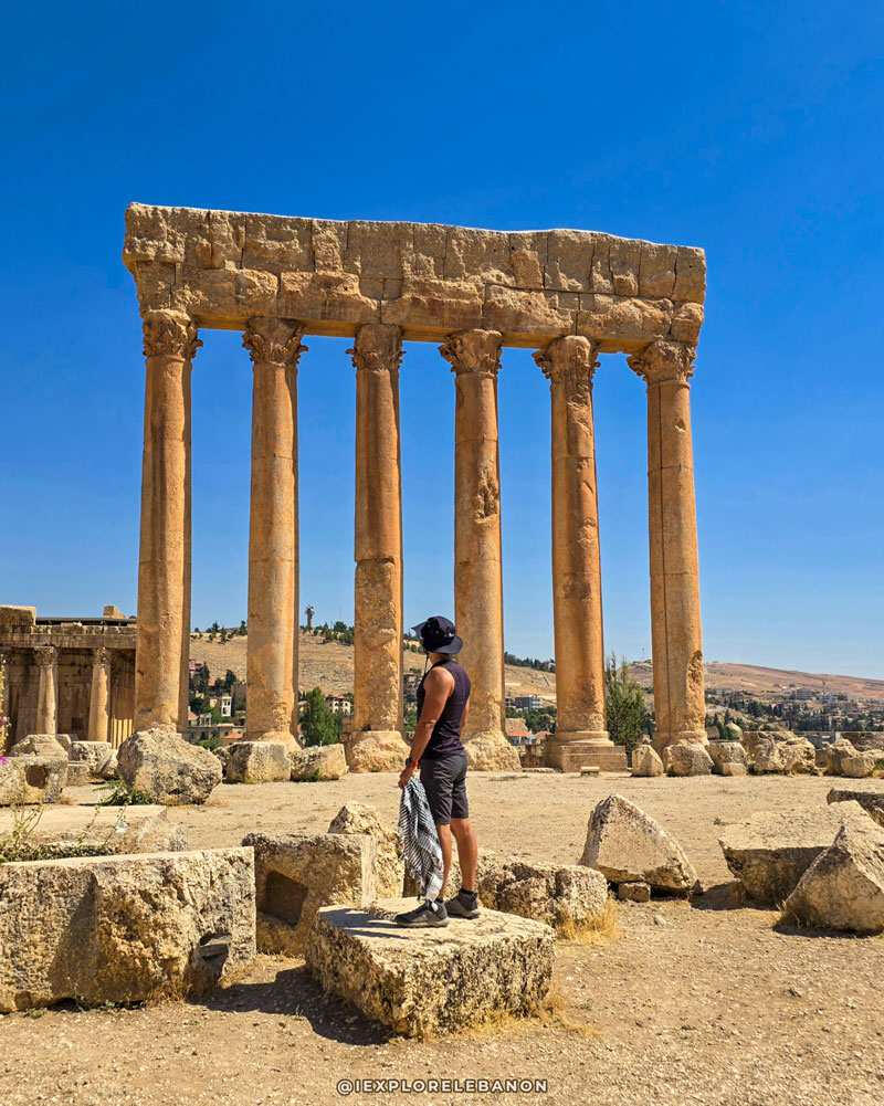 Traveler exploring Baalbek Roman ruins in Lebanon during a public or private guided cultural tour